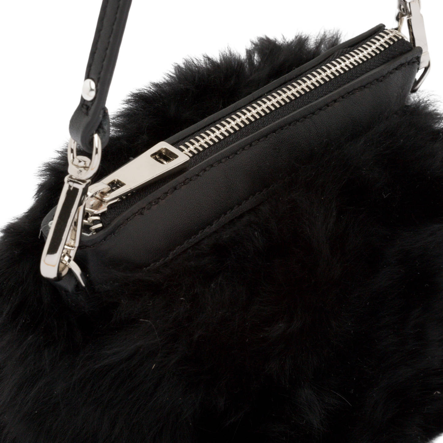 small purse in alpaca fur with leather handle and zip closure